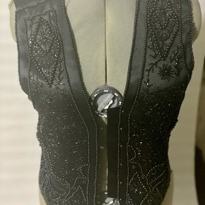 Black onyx beaded vest lined with bemberg rayon.